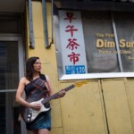 Ebony Tay mesmerizes a Chinatown crowd following her tour in Spain. Ebony Tay’s solo guitar performance in high heels, as she prepares for a U.S. College Tour in 2015.