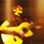 Ebony Tay’s guitar and voice mesmerized a sold out show at the Zihuatanejo Guitar Festival. Ebony Tay plays a solo performance a the Zihuatanejo Guitar Festival in Mexico